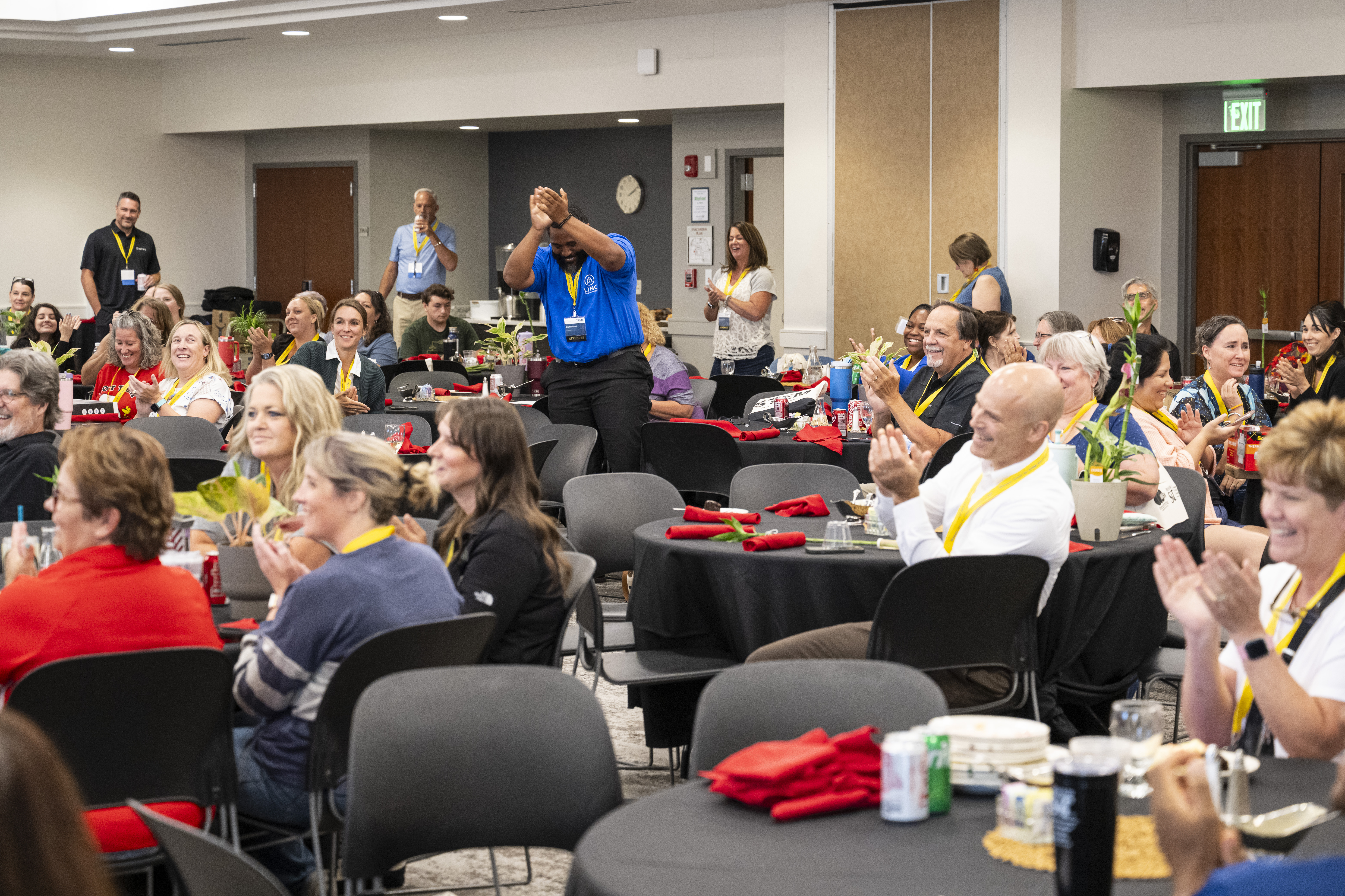Teachers applauding at the 2025 Annual STEM Conference